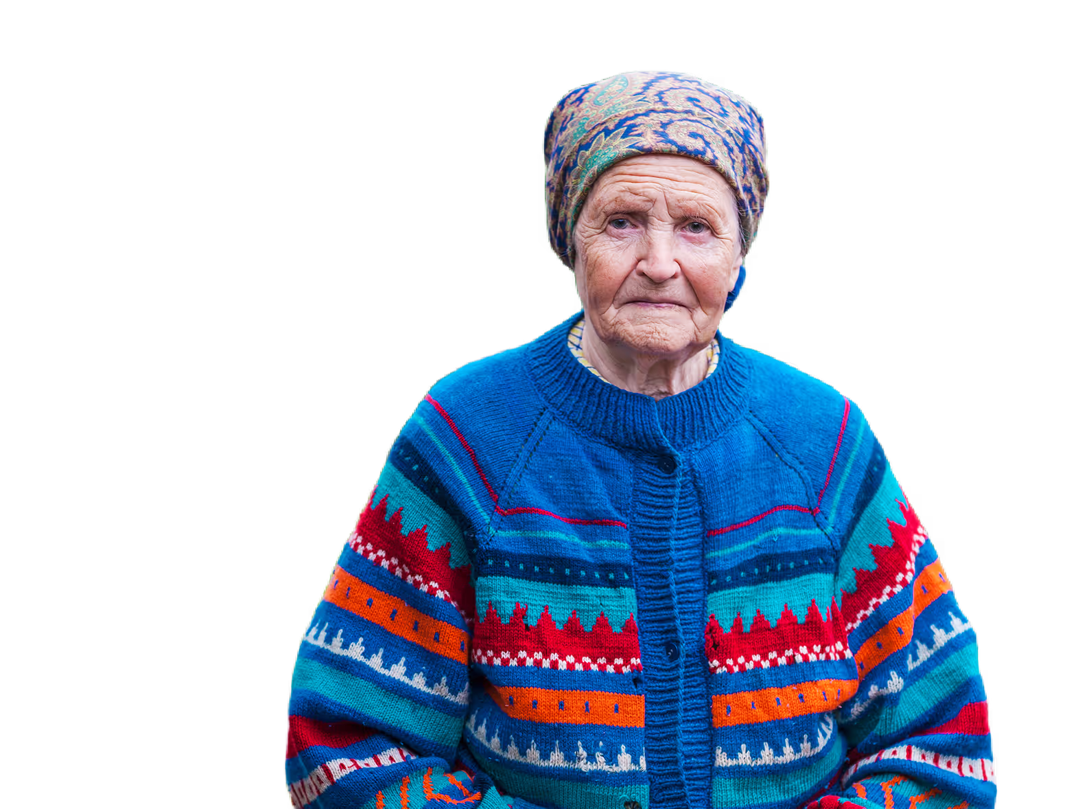“Elderly woman in a colorful sweater, symbolizing aging with dignity at home.”